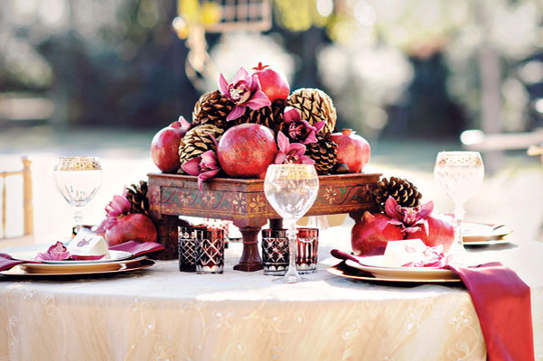 winter-wedding-centerpiece-pinecones-pomegranate-kismis-ink-photography