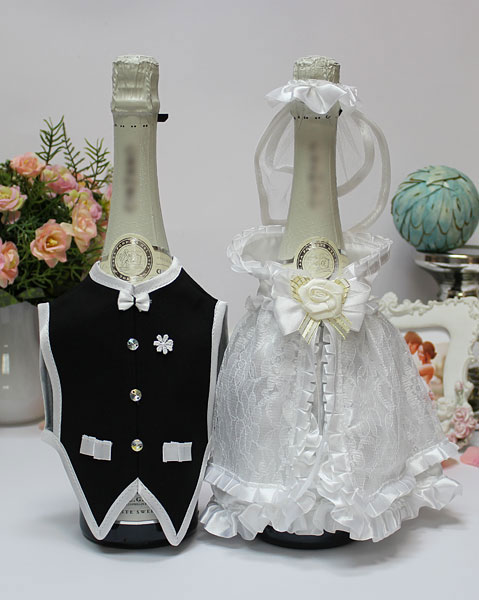 Костюмы жениха и невесты для шампанского